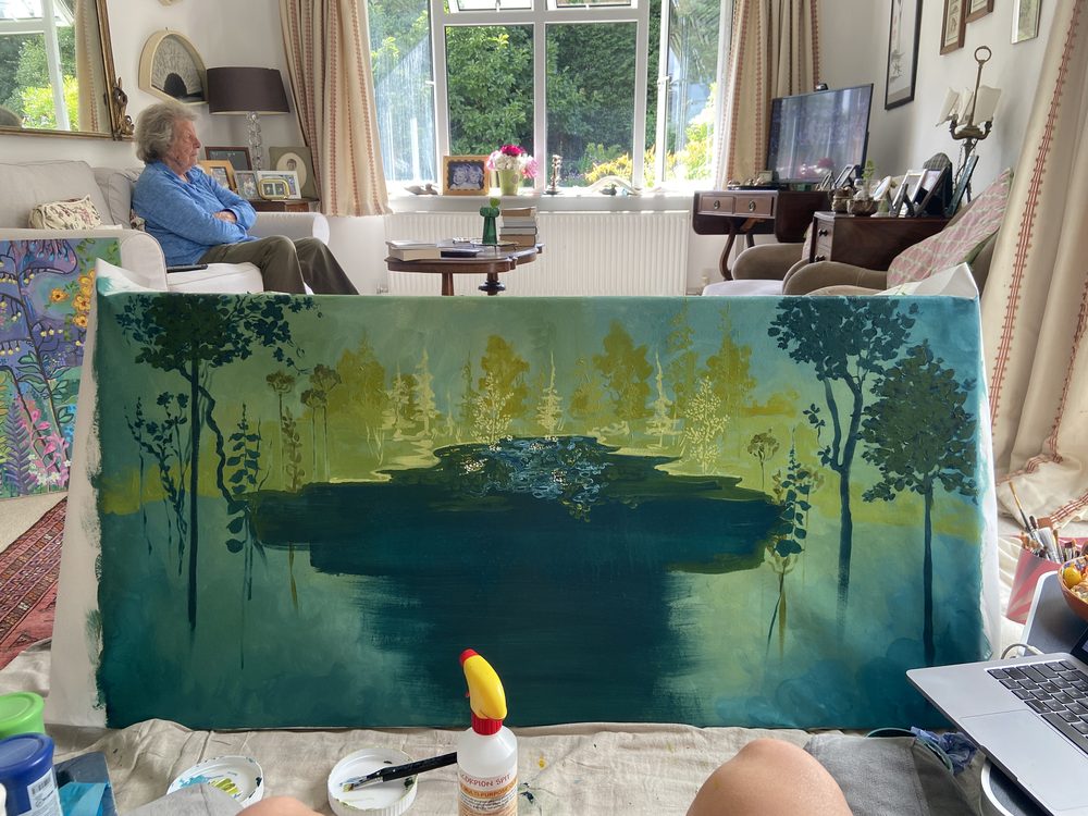 A dark lake and island added in the middle of the forest