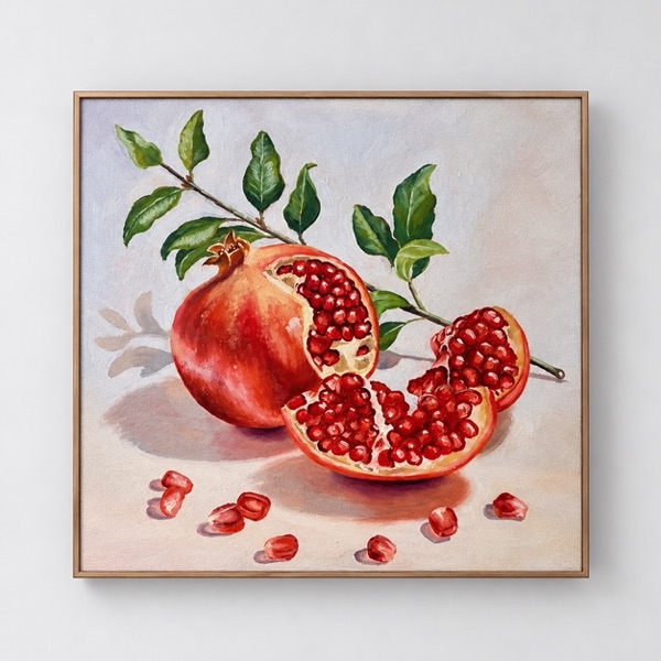 Still life painting of a pomegranate branch with a cut-open fruit and scattered seeds