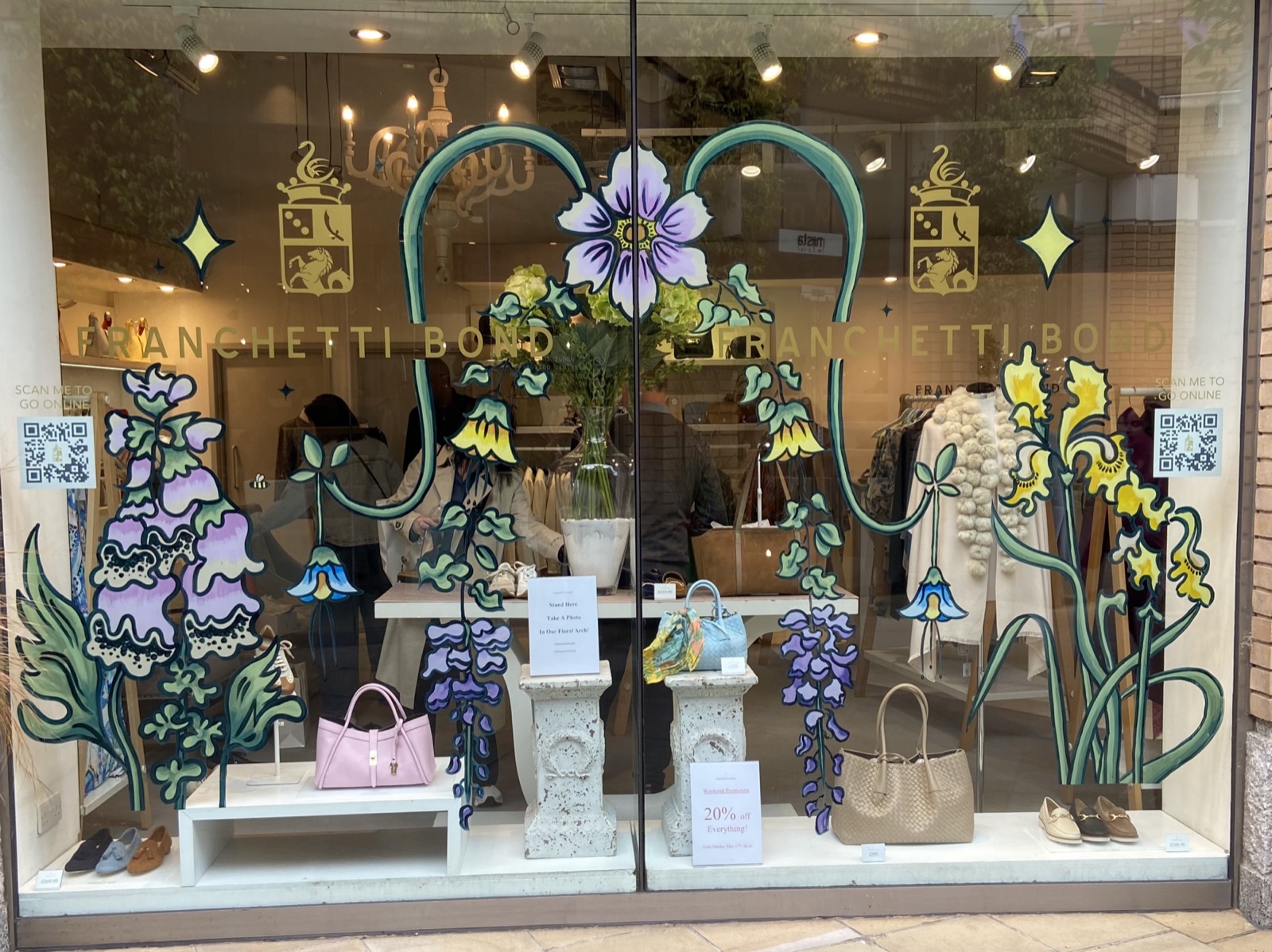 Hand-painted floral mural on the Chelsea Flower Shop storefront window